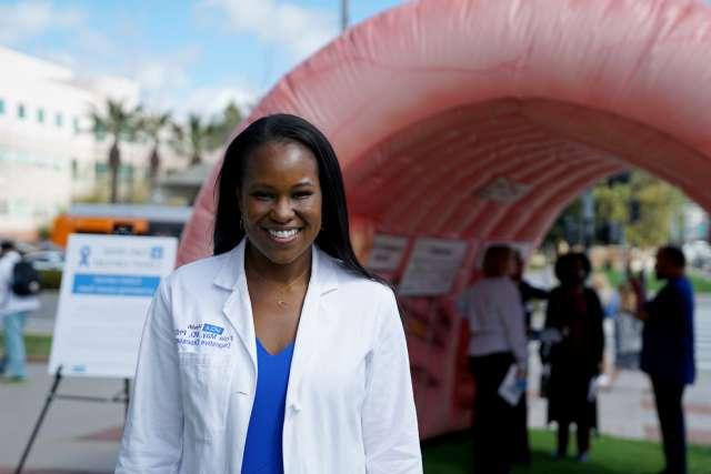 UCLA's Dr. Fola May at a colorectal cancer screening community event